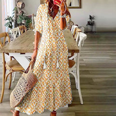 Chic Bohemian V-Neck Midi Dress with Three-Quarter Sleeves