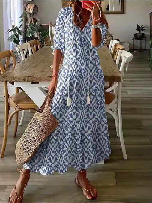 Chic Bohemian V-Neck Midi Dress with Three-Quarter Sleeves