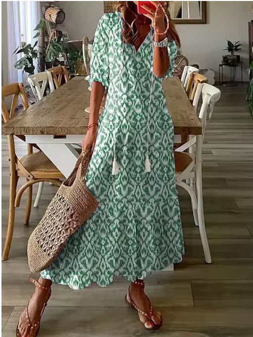 Chic Bohemian V-Neck Midi Dress with Three-Quarter Sleeves